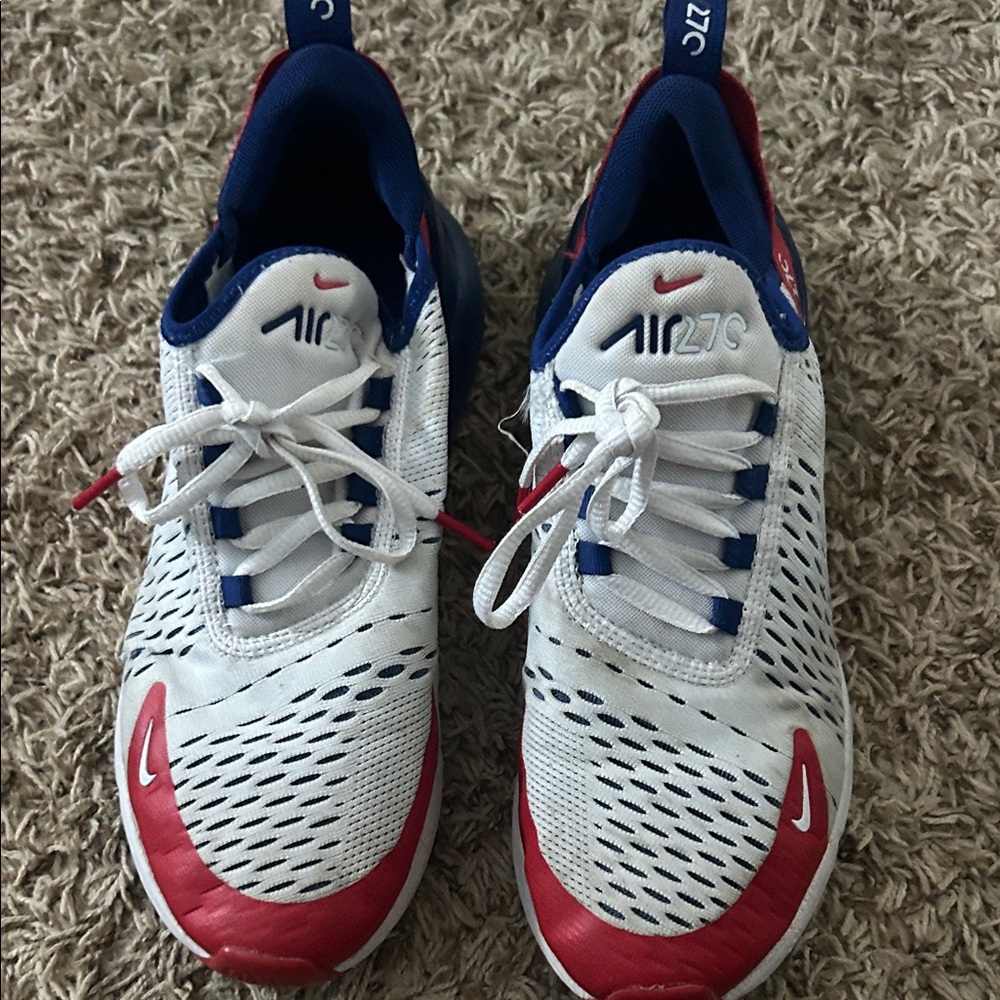 Red, white, and blue nike airmax 270s